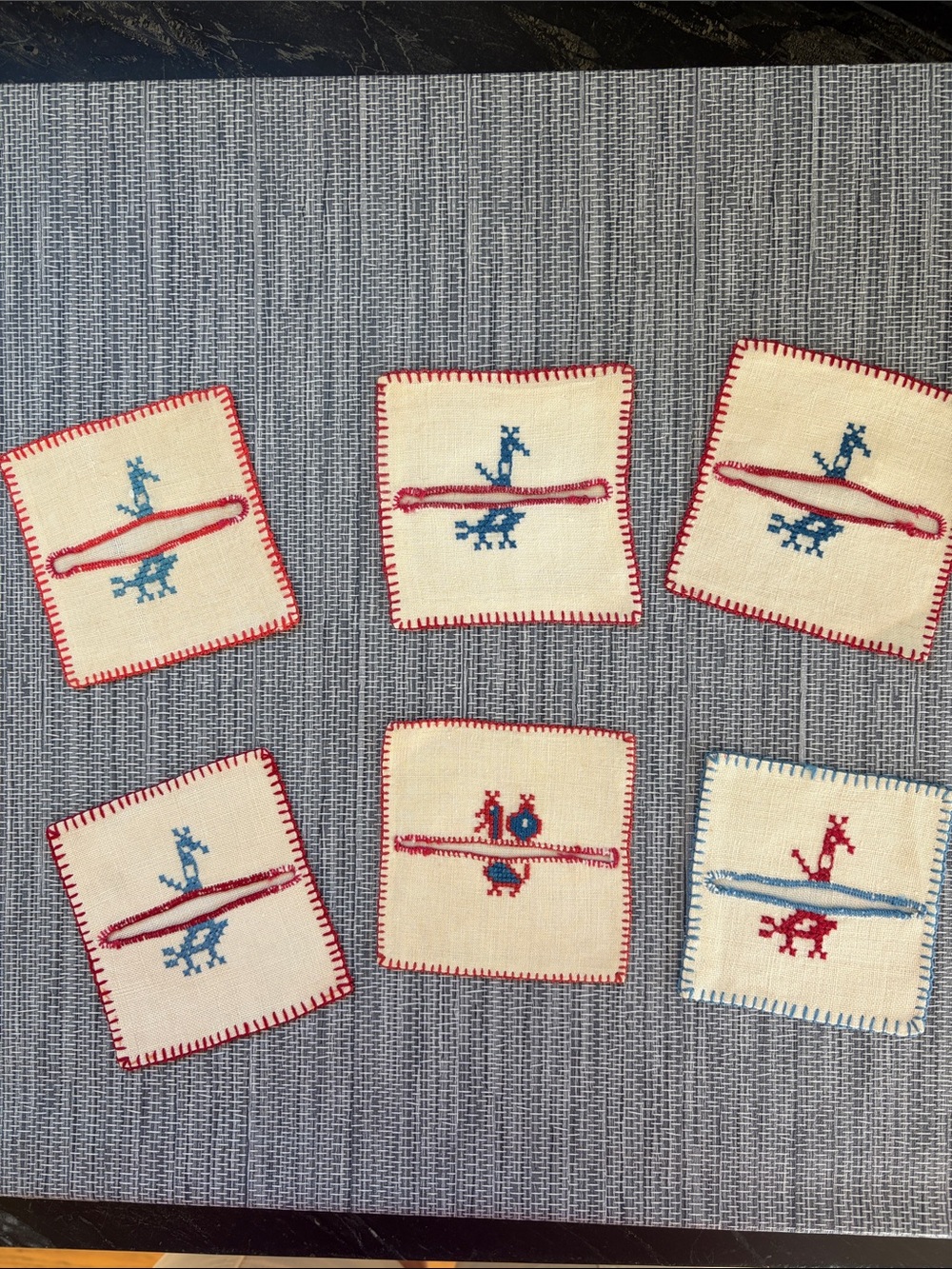 Set of Six Hand-Embroidered Animal Coasters - Red & Blue on Cream